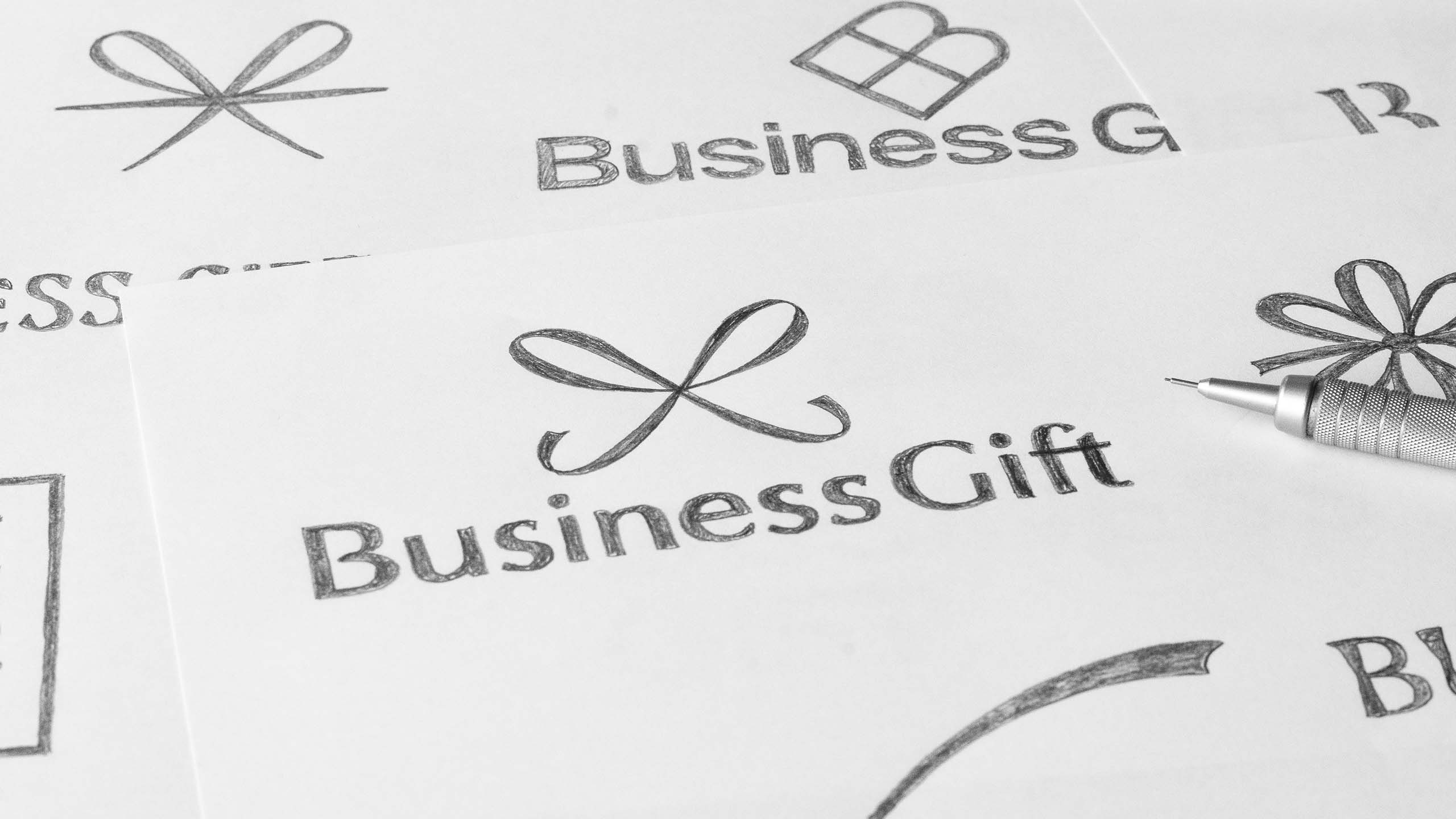 Sketches for the Business Gift logo.